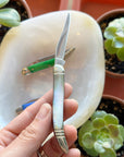Elevate your urban carry with the Toothpick Knife—featuring a sleek black pearl handle, mirror-finish stainless blade, and nickel silver details for timeless style.
