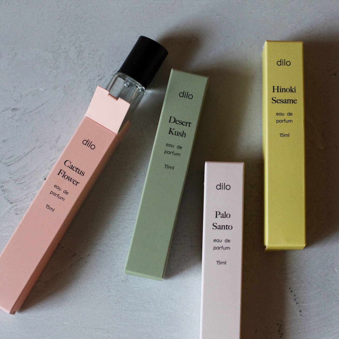 Elevate your senses with Dilo's unique fragrances—15ml fine mist sprays, expertly crafted in Philadelphia for a bold, personal scent experience.