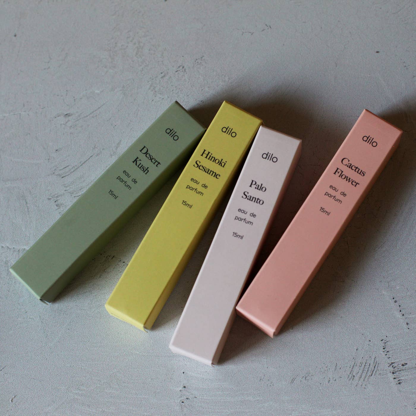 Elevate your senses with Dilo's unique fragrances—15ml fine mist sprays, expertly crafted in Philadelphia for a bold, personal scent experience.