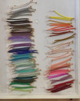 Pick your perfect color.
The Irena Bracelet is made to order in your choice of color from a wide selection of solid hues. It’s an easy way to create something just for you.
Each bracelet is handcrafted with beautiful Japanese glass beads on an adjustable cord that comfortably fits most wrists. You can choose from three metal finishes: 14k gold-filled with silk cord, sterling silver with silk cord, or brass with nylon cord. The Irena is simple, stackable, and uniquely yours.