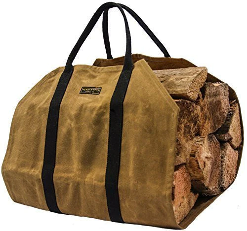 Tan waxed canvas firewood log carrier with webbing handles