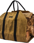 Tan waxed canvas firewood log carrier with webbing handles