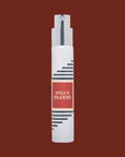 White Imaginary Authors travel spray with a red Bull's Blood label on a dark brown background