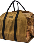 Tan waxed canvas firewood log carrier with webbing handles