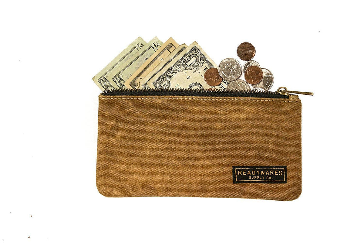Waxed canvas zip pouches in tan, olive, navy and black