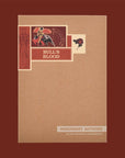 Kraft paper Imaginary Authors box with a red Bull's Blood label, on a dark brown background