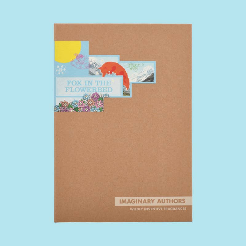 Kraft paper Imaginary Authors box with a fox and flowers Fox in the Flowerbed label, on a pale blue background