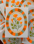 Stack of birthday cards with floral design and 'Happy Birthday' text
