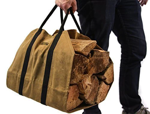 Tan waxed canvas firewood log carrier with webbing handles