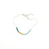 Dusk bracelet with teal, gold and seafoam glass beads on a silver chain, on white