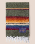 Olive green sarape blanket with a band of red, orange, purple and blue stripes