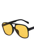 Black frame double bridge aviator sunglasses with yellow lenses on white