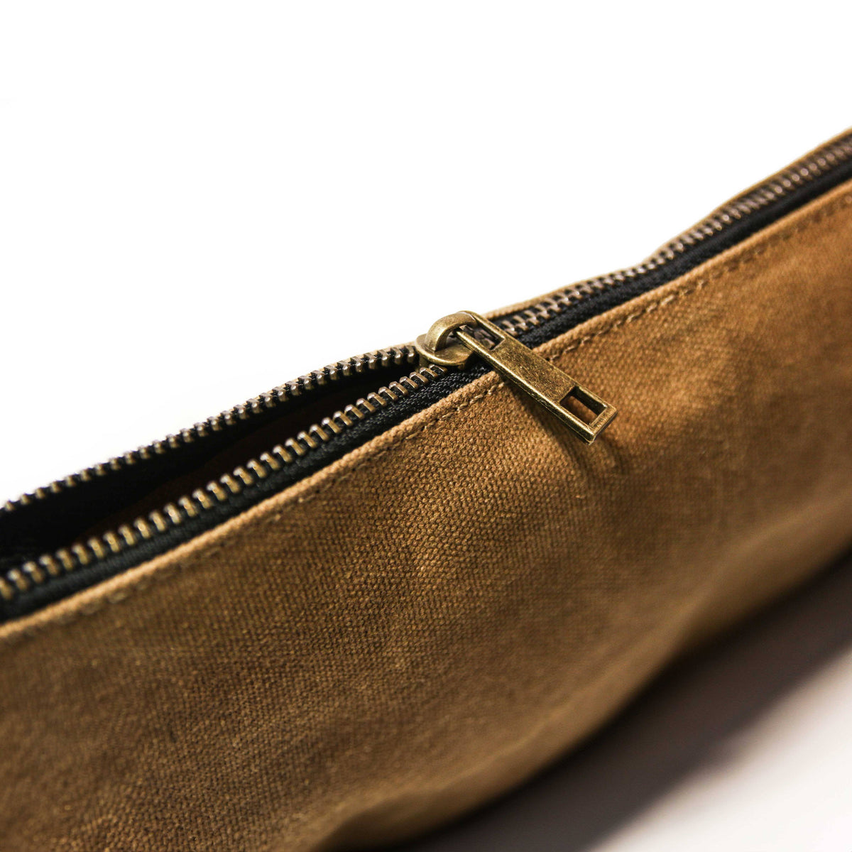 Waxed canvas zipper tool bags in tan, olive, navy and black