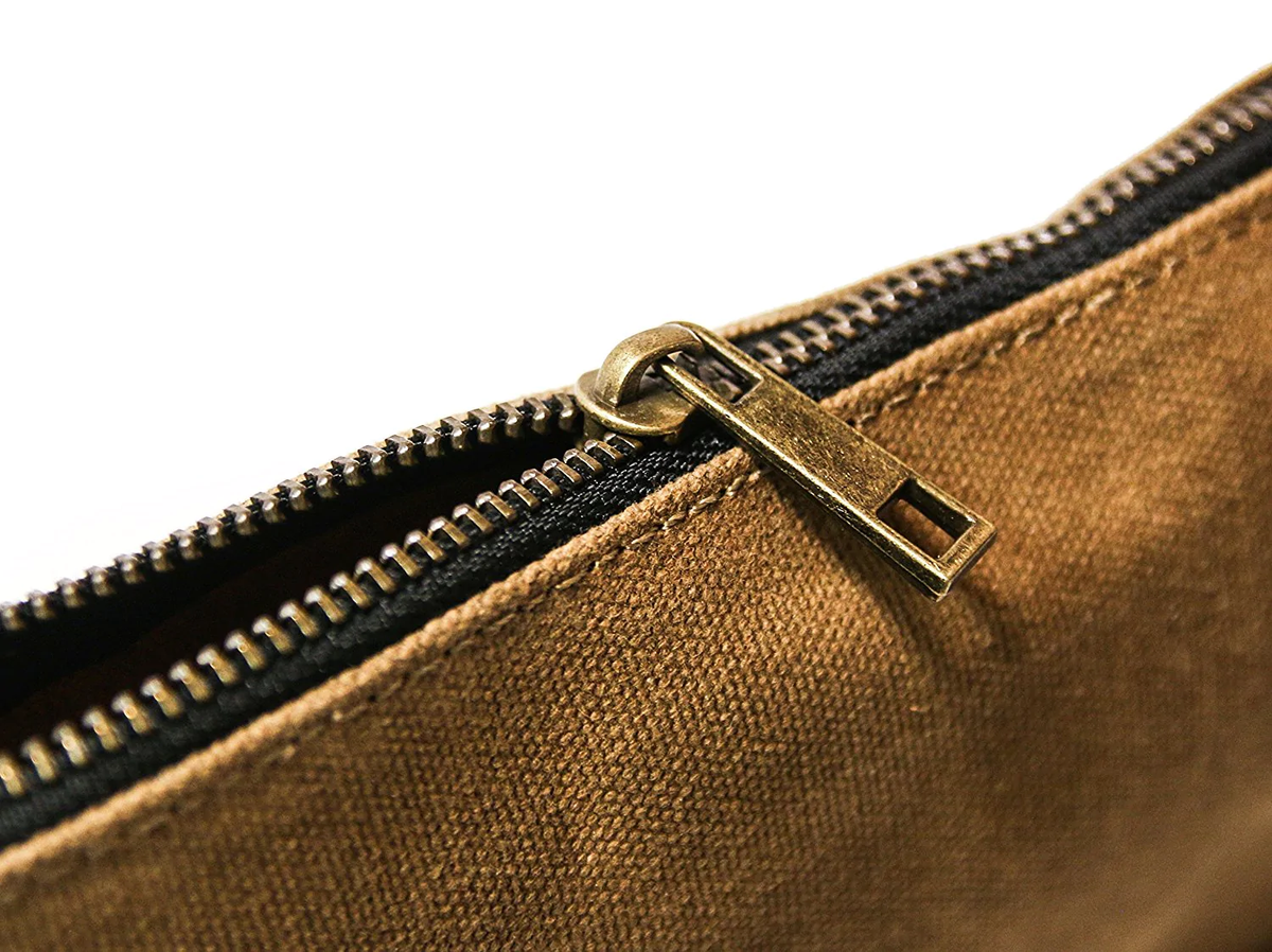 Waxed canvas zip pouches in tan, olive, navy and black