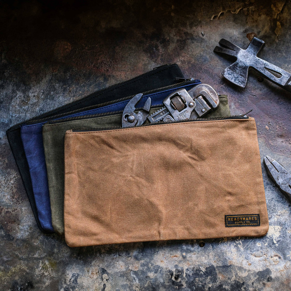 Waxed canvas zipper tool bags in tan, olive, navy and black