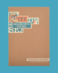 Kraft paper Imaginary Authors box with a collage Falling into the Sea label, on a blue background