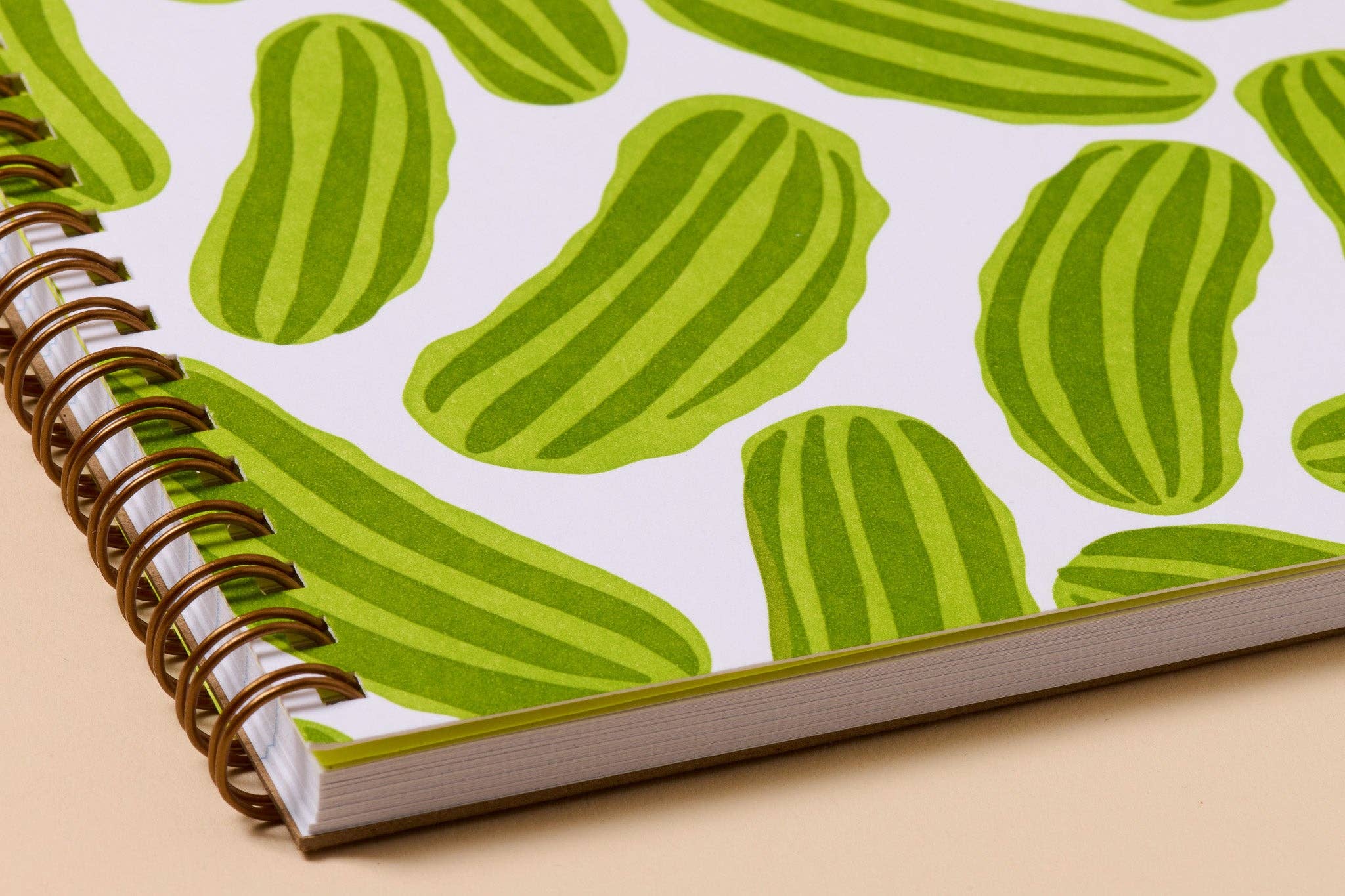 Dreams do come true, especially when they involve pickles. This snack-inspired spiral notebook features quirky illustrated pickles on a letterpress printed cover and 48 lined pages inside. It&#39;s the perfect size to carry your notes, lists, ideas, or secret snack plans.&amp;nbsp;