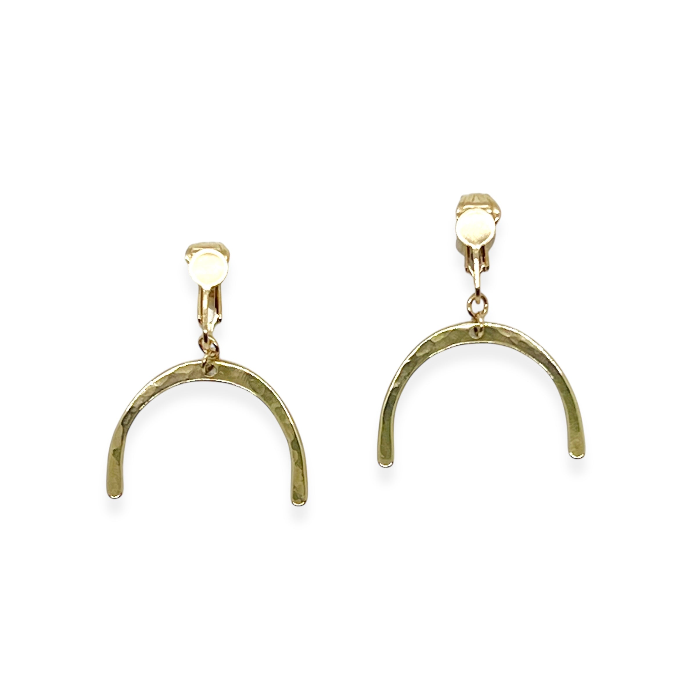 This Adaptive Add-On converts your Son of a Sailor earrings into easy-to-wear clip-ons. It&#39;s perfect for those without pierced ears, those with sensitive or stretched earlobes, or anyone who finds traditional earwires challenging. Available in sterling silver or 14k gold-filled, it offers a comfortable, accessible fit without sacrificing style.