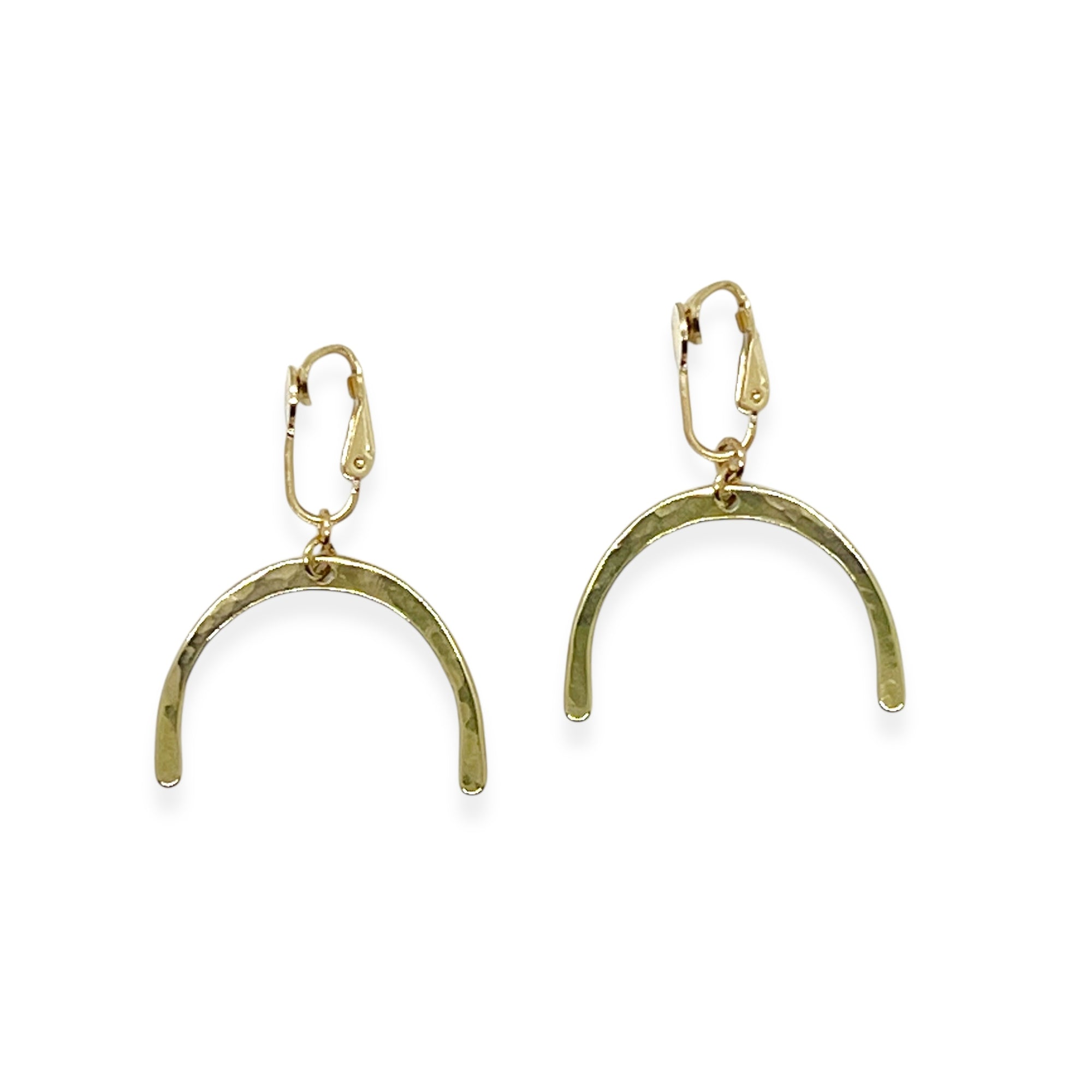 This Adaptive Add-On converts your Son of a Sailor earrings into easy-to-wear clip-ons. It's perfect for those without pierced ears, those with sensitive or stretched earlobes, or anyone who finds traditional earwires challenging. Available in sterling silver or 14k gold-filled, it offers a comfortable, accessible fit without sacrificing style.