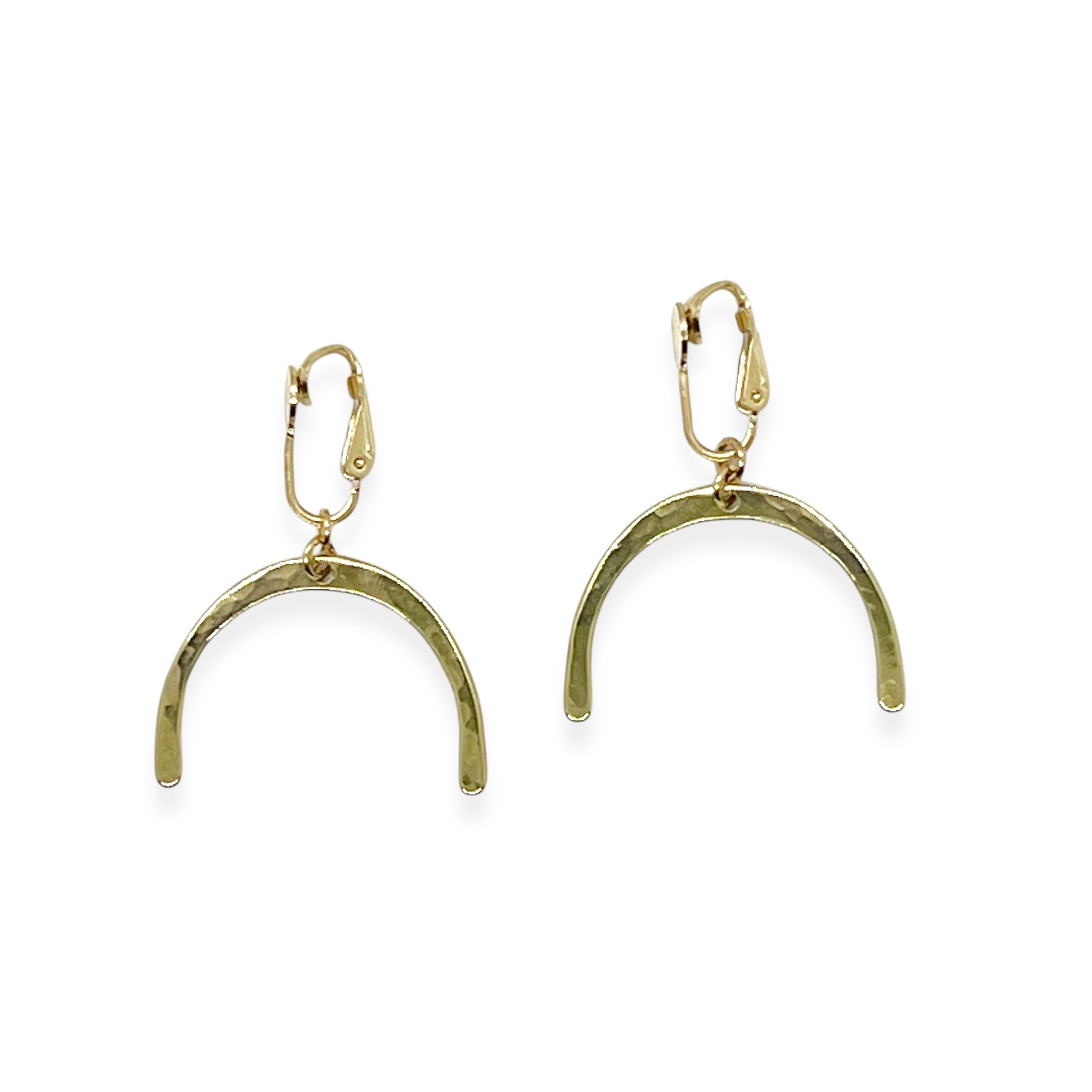 This Adaptive Add-On converts your Son of a Sailor earrings into easy-to-wear clip-ons. It&#39;s perfect for those without pierced ears, those with sensitive or stretched earlobes, or anyone who finds traditional earwires challenging. Available in sterling silver or 14k gold-filled, it offers a comfortable, accessible fit without sacrificing style.