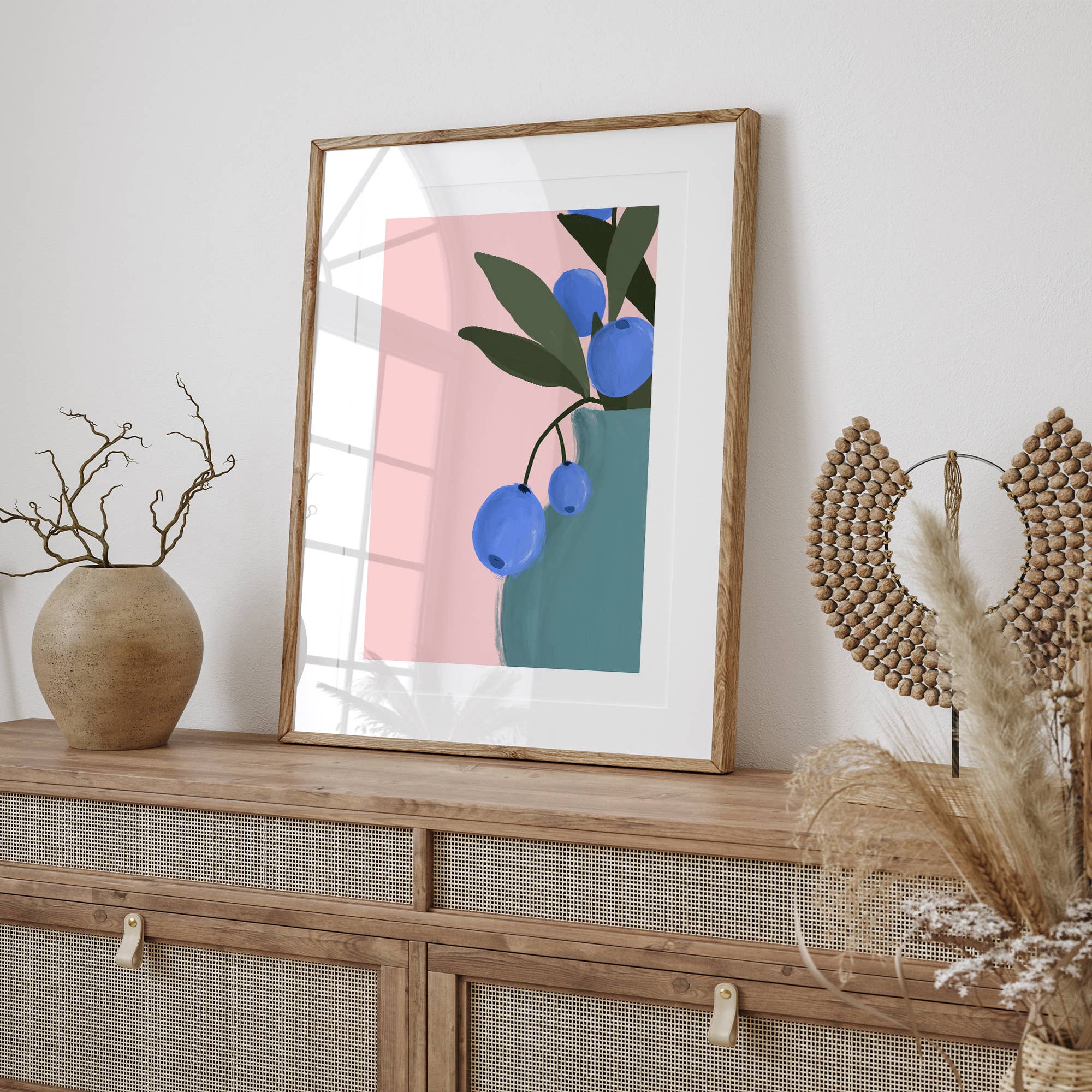 Bring color to your walls with this vibrant blueberry bouquet print! A bold pink background and modern style add cheerful energy to any space.