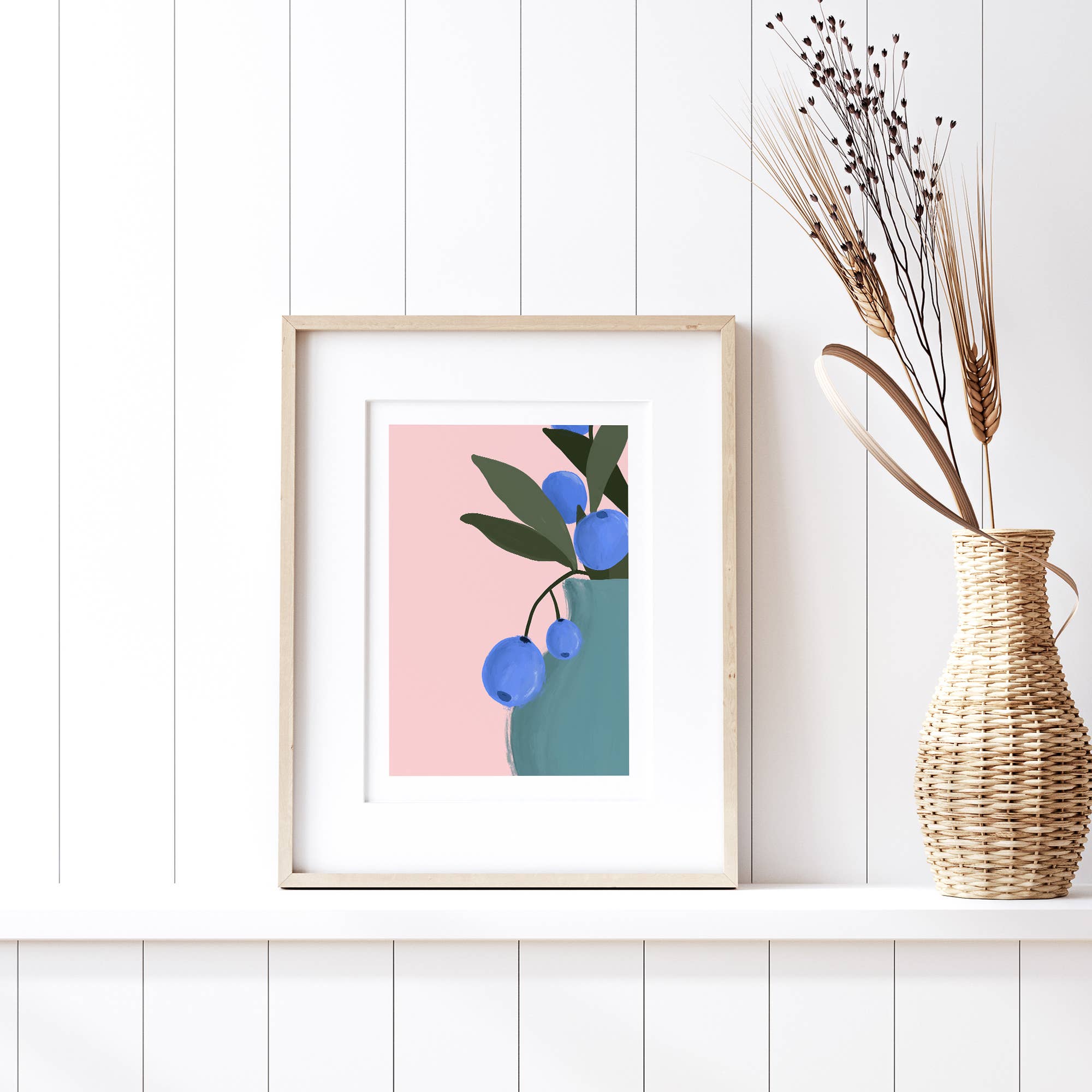 Bring color to your walls with this vibrant blueberry bouquet print! A bold pink background and modern style add cheerful energy to any space.