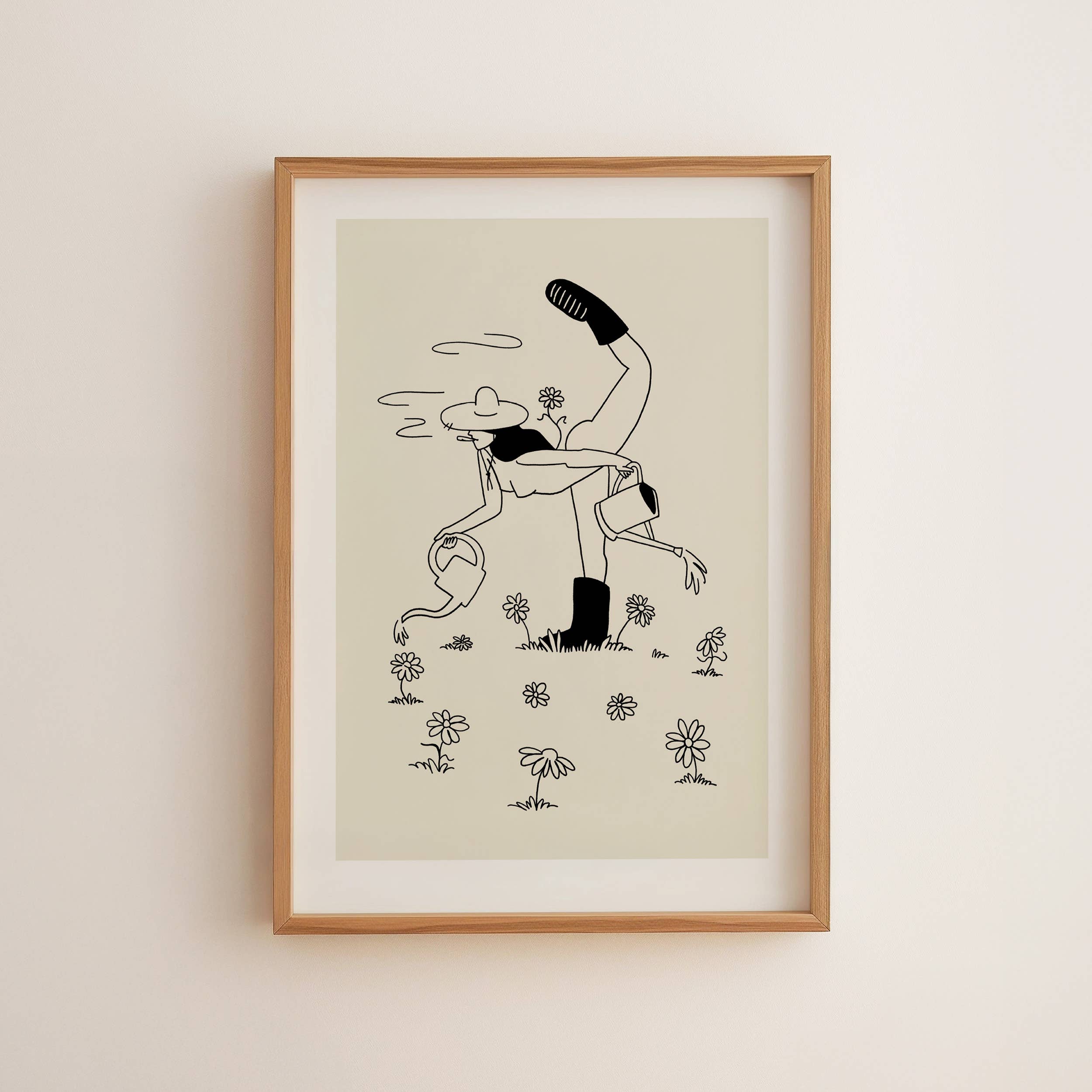 Framed artwork of a stylized illustration on a beige wall