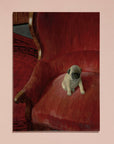 Puppy sitting on a red velvet chair with a pink border