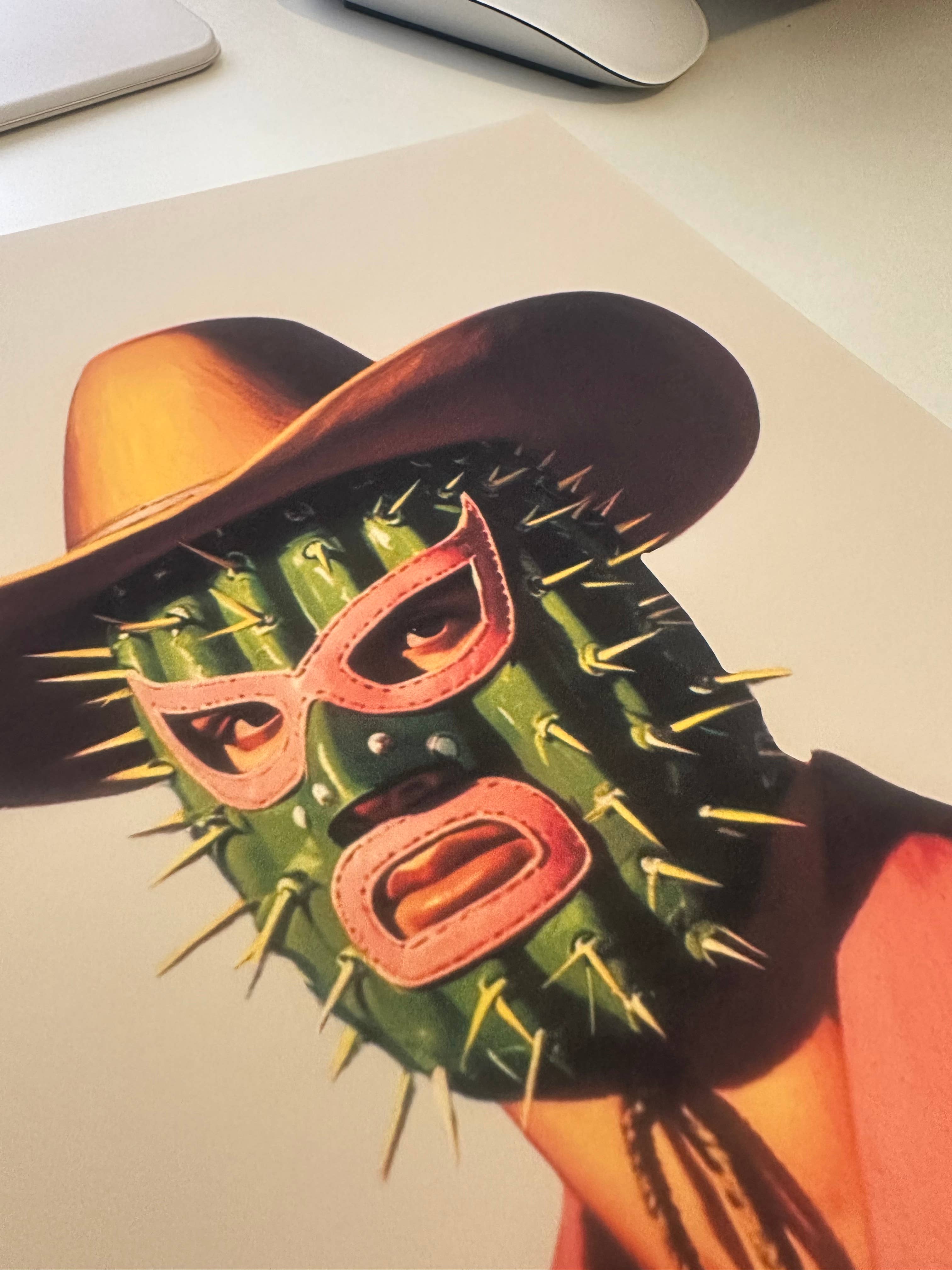 Retro cowboy in a cactus lucha libre mask, printed on archival matte paper. 8x10" bold art perfect for modern, maximalist, or western-inspired decor.