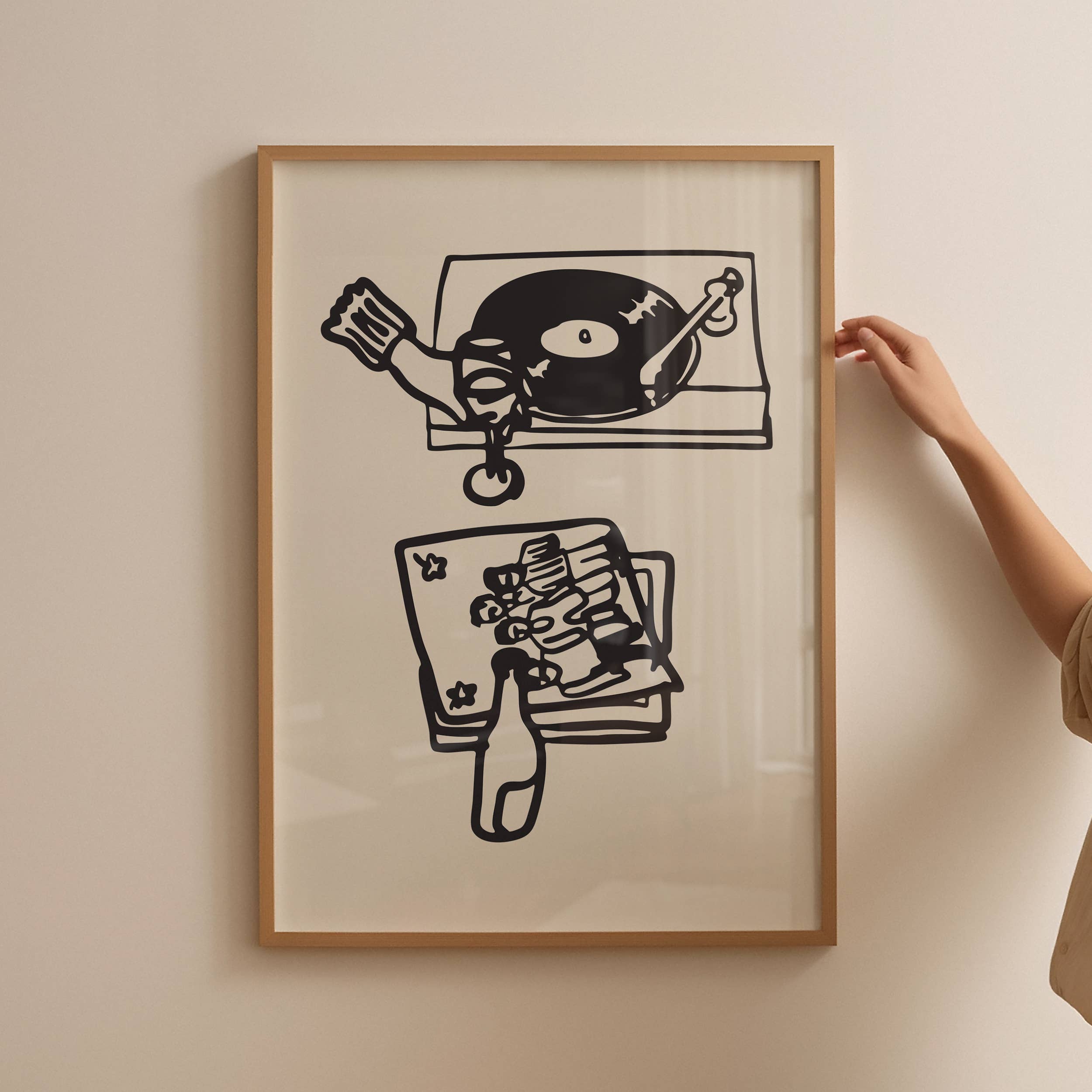 This piece of art celebrates the perfect night in. This unframed art print is a charming illustration of the ultimate combination: wine and vinyl. With its scribbley line texture, it has a wonderfully relaxed feel and modern aesthetic that’s a perfect addition to a living room, bar cart, or cozy reading nook. Perfect for wine lovers and foodies.
