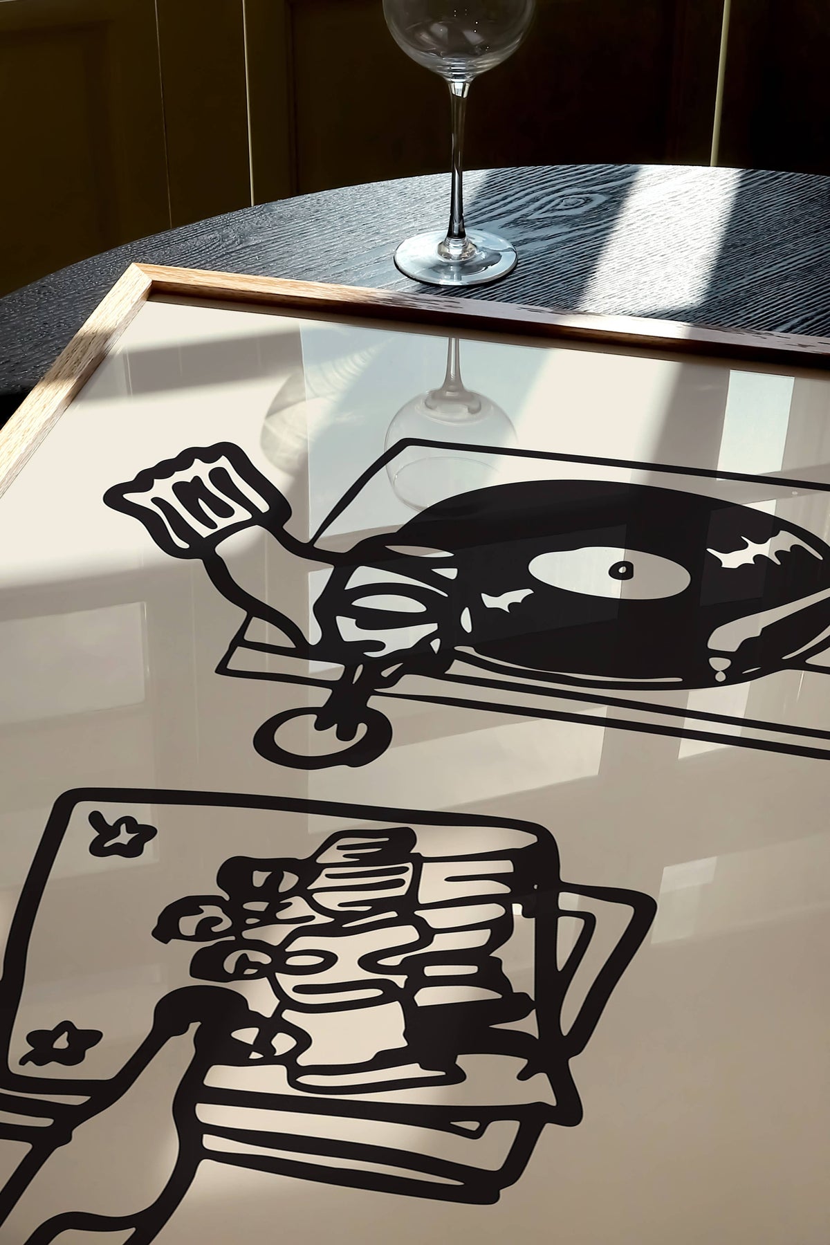 This piece of art celebrates the perfect night in. This unframed art print is a charming illustration of the ultimate combination: wine and vinyl. With its scribbley line texture, it has a wonderfully relaxed feel and modern aesthetic that’s a perfect addition to a living room, bar cart, or cozy reading nook. Perfect for wine lovers and foodies.