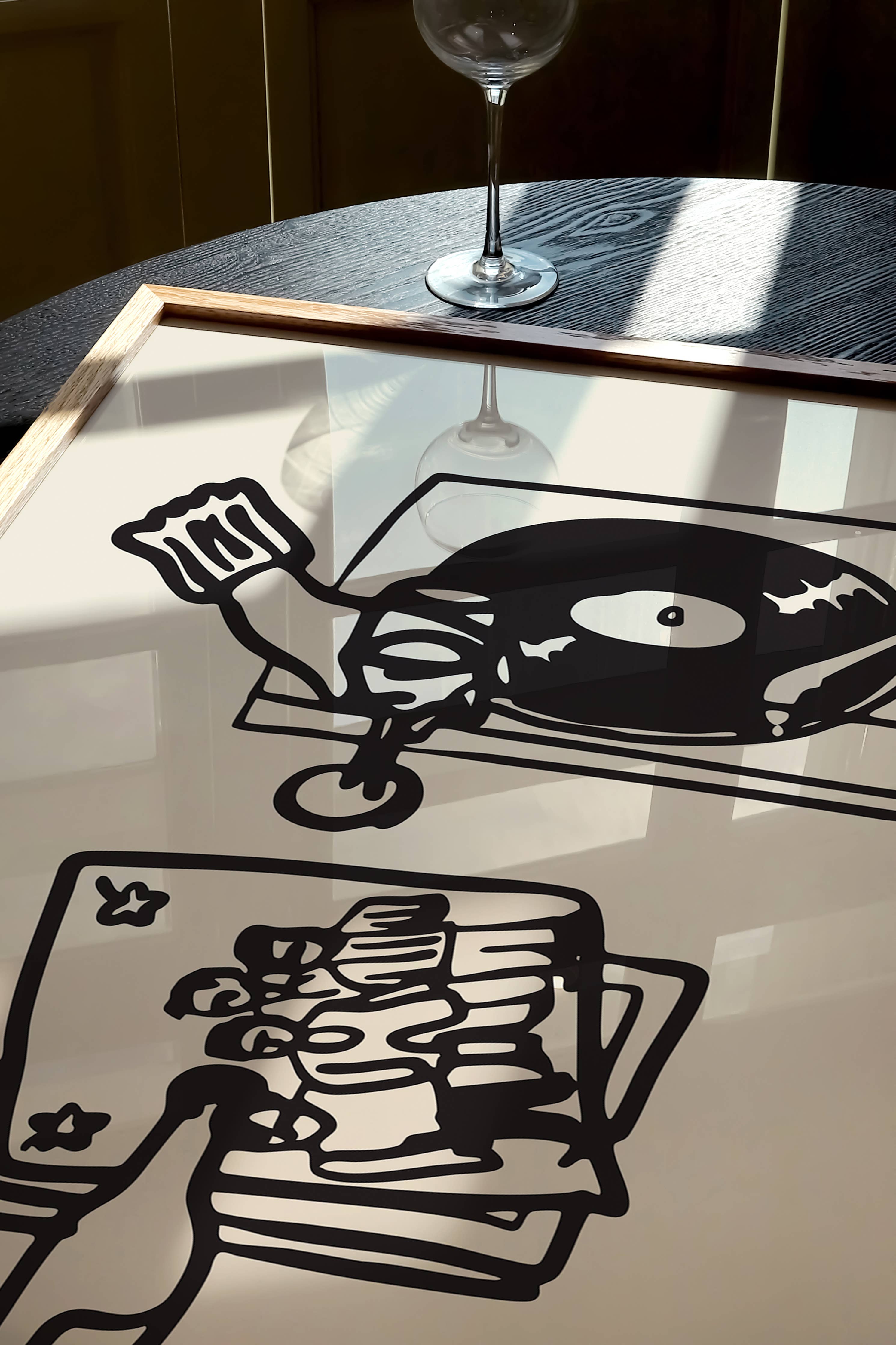 This piece of art celebrates the perfect night in. This unframed art print is a charming illustration of the ultimate combination: wine and vinyl. With its scribbley line texture, it has a wonderfully relaxed feel and modern aesthetic that’s a perfect addition to a living room, bar cart, or cozy reading nook. Perfect for wine lovers and foodies.