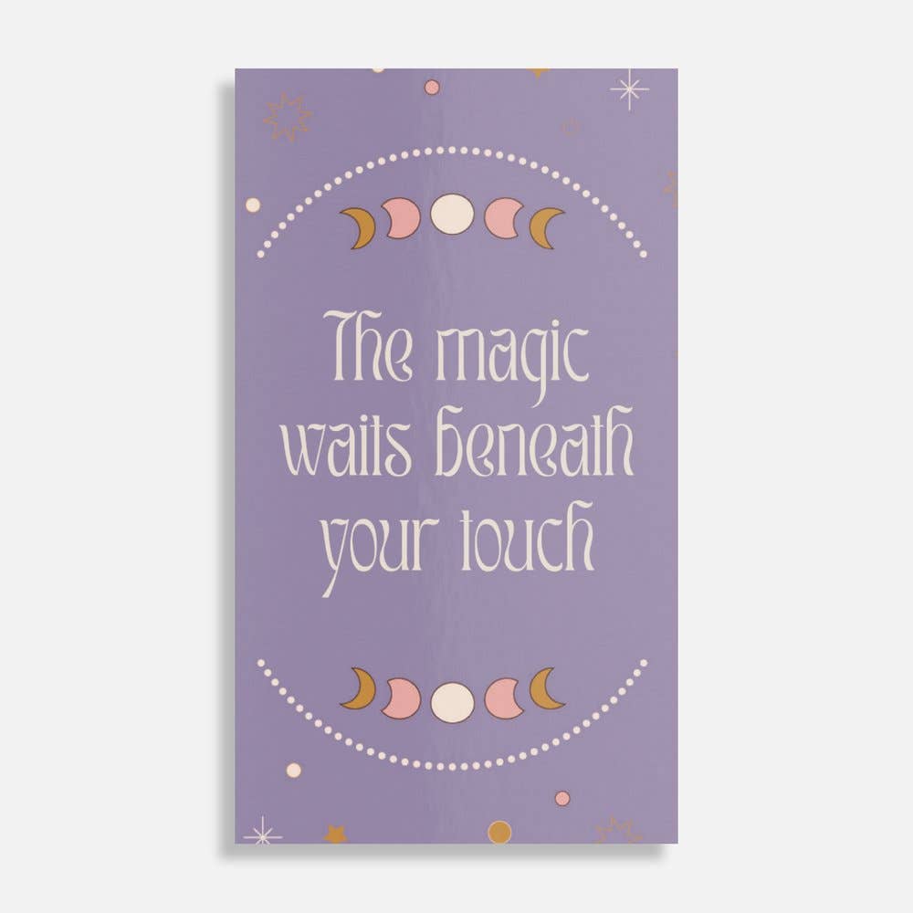 Purple card with moon phases and text 'The magic waits beneath your touch' on a white background