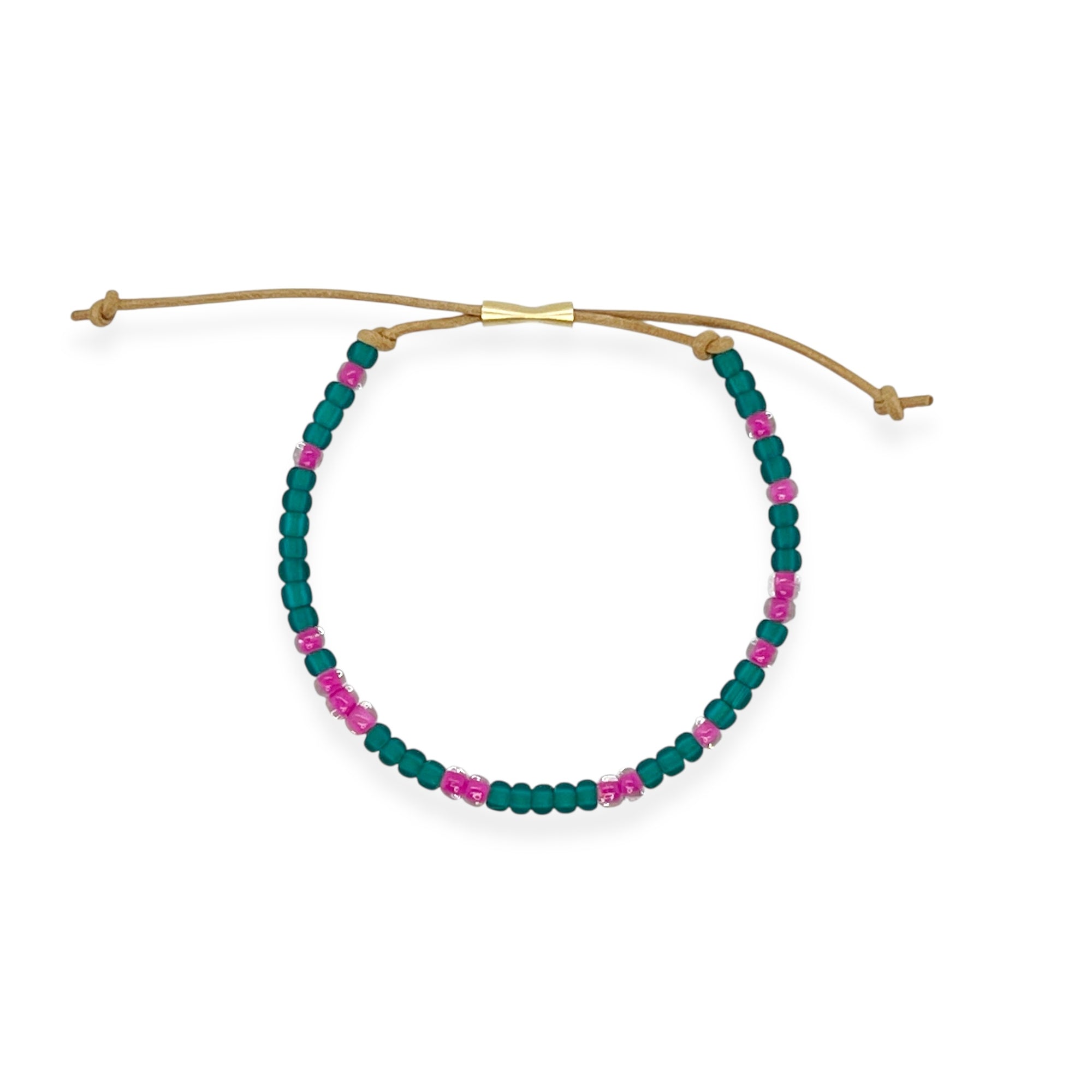 Part of our nostalgic friendship bracelet collection, this version features beautifully crafted Japanese glass beads strung on durable, comfortable cord and finished with a 14k gold-filled sliding clasp. It offers the same unisexy, elevated take on throwback style, perfect for stacking or wearing solo.