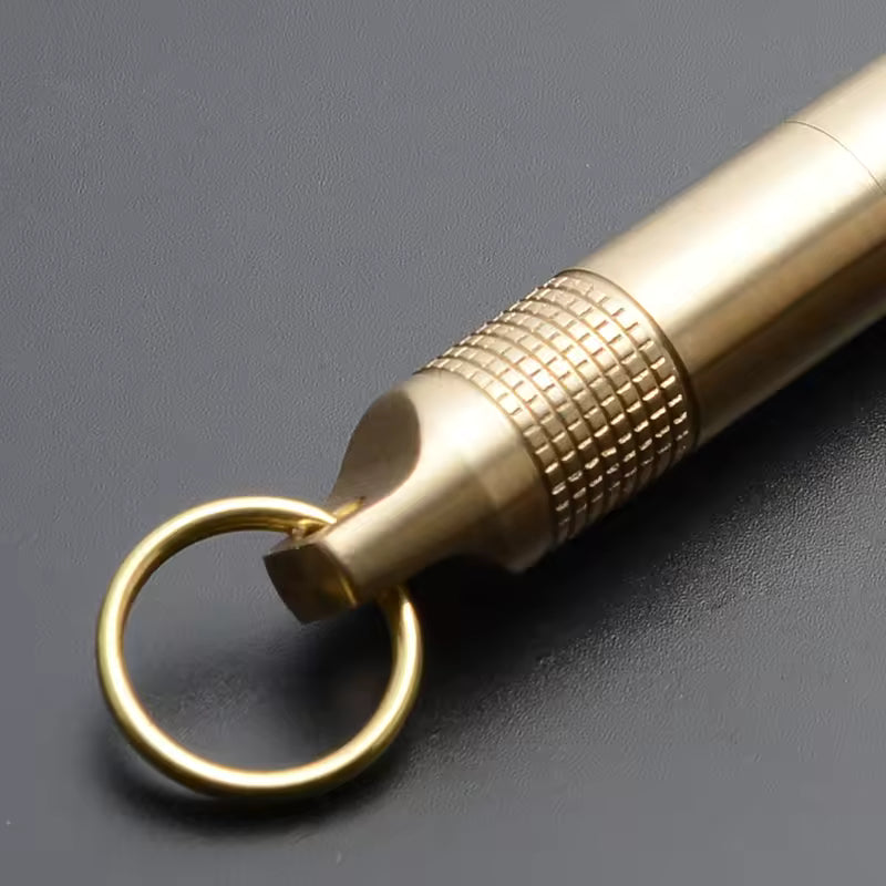 A sleek and sturdy brass cigarette case keychain that's as practical as it is cool. Waterproof and crush-proof, this metal cigarette case clips right onto your bag or keys and keeps your cigarettes, pills, or toothpicks safe and secure wherever you go. This compact keychain cigarette holder slips discreetly into any pocket or purse without the bulk.