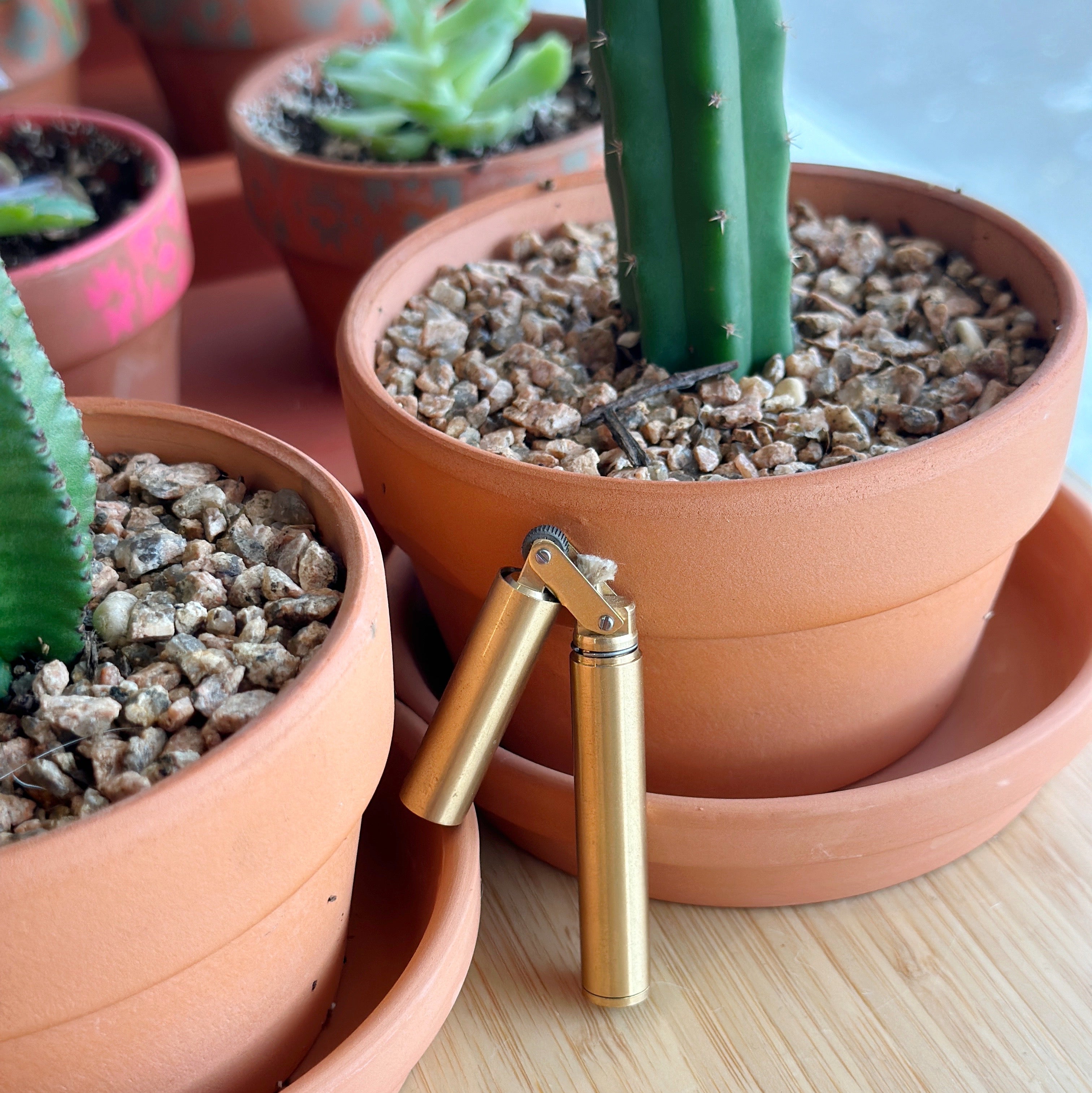 Elevate your everyday rituals with the Brass Stick Lighter. Made of durable brass, this refillable lighter features a high ignition rate flint wheel, ensuring reliable performance. Its ergonomic design makes sparking a flame a breeze.&nbsp;