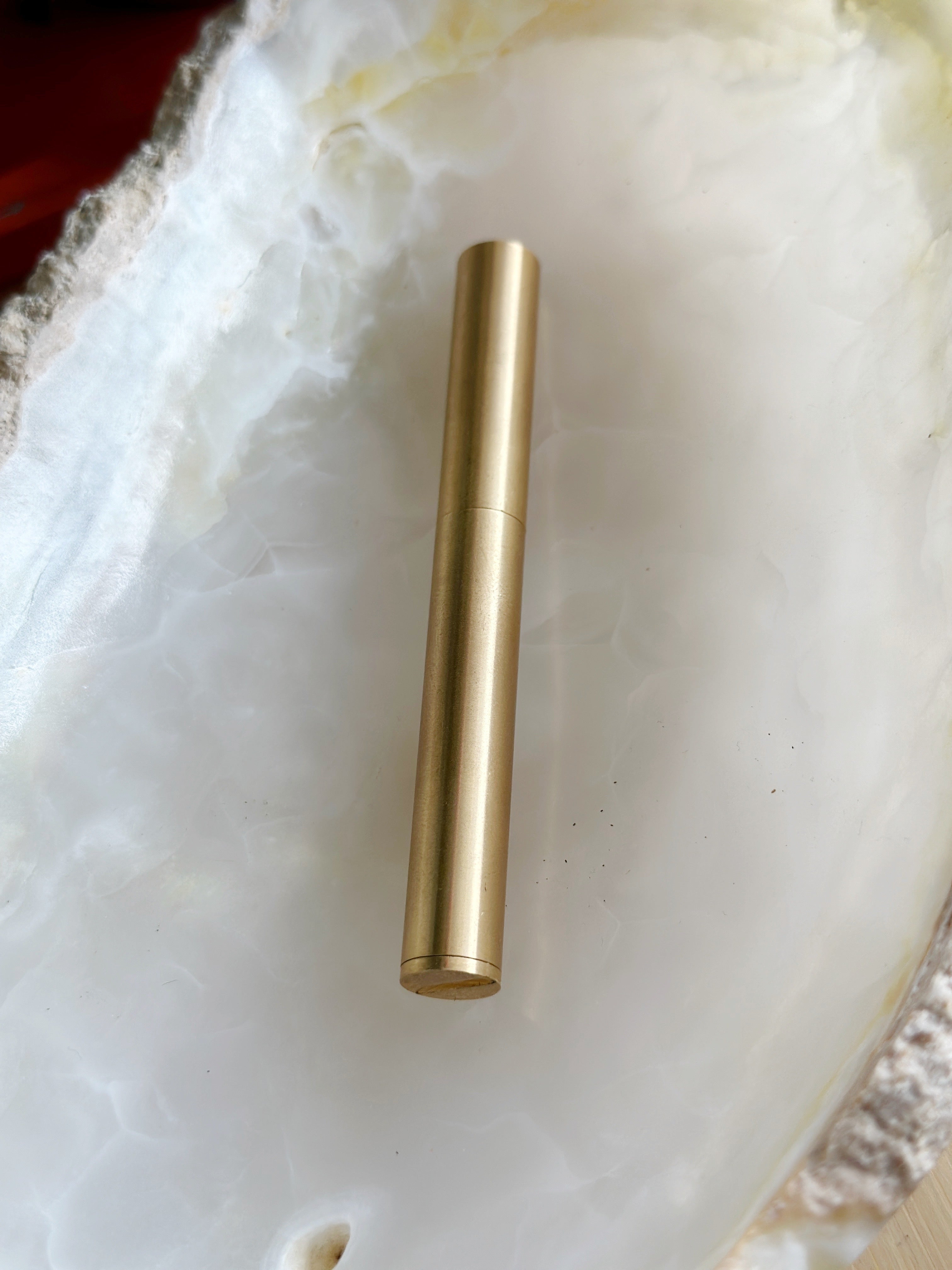 Elevate your everyday rituals with the Brass Stick Lighter. Made of durable brass, this refillable lighter features a high ignition rate flint wheel, ensuring reliable performance. Its ergonomic design makes sparking a flame a breeze.&nbsp;