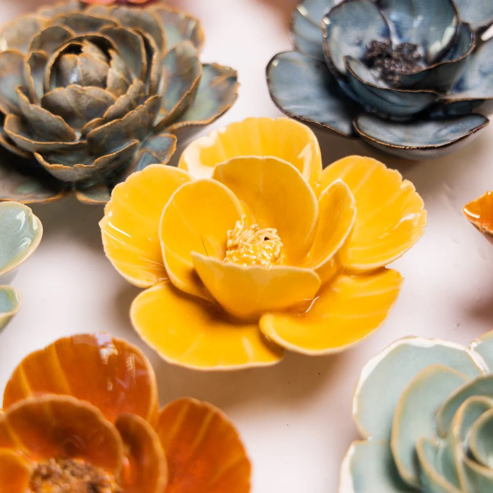 Bring everlasting blooms into your space with ceramic flowers—beautiful, handmade pieces that add a touch of nature-inspired charm without the upkeep. Each flower comes packaged in a lovely gift box and features a keyhole back, so you can display it on a wall or style it on a tabletop. Perfect for creating a blooming statement that never fades.