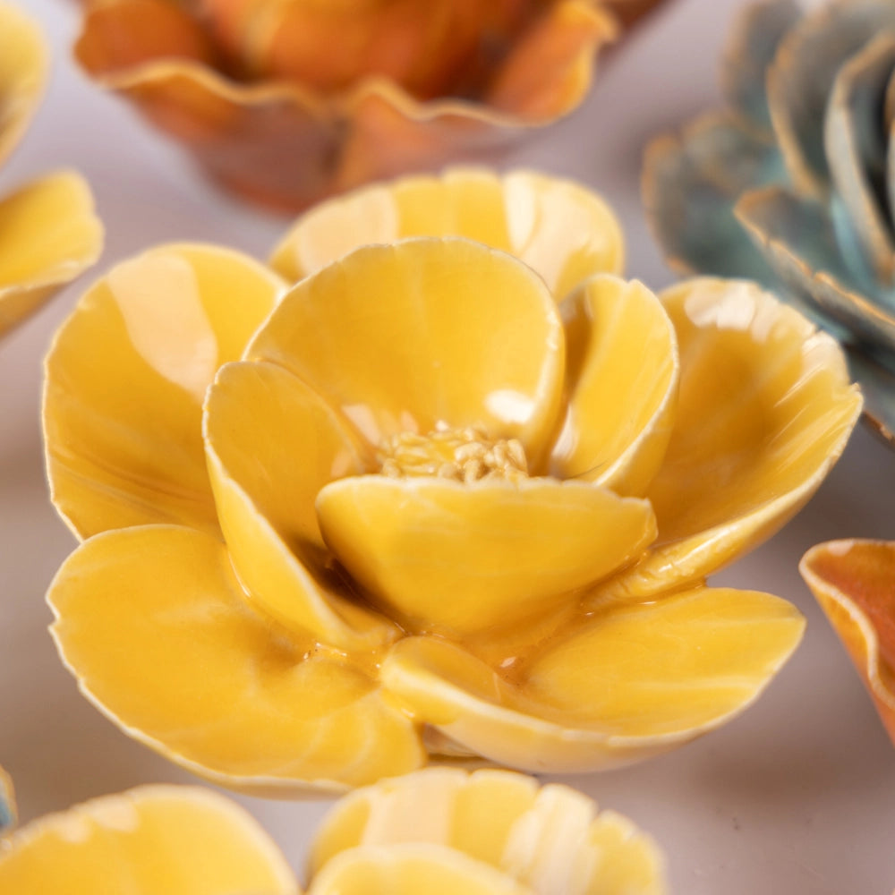 Bring everlasting blooms into your space with ceramic flowers—beautiful, handmade pieces that add a touch of nature-inspired charm without the upkeep. Each flower comes packaged in a lovely gift box and features a keyhole back, so you can display it on a wall or style it on a tabletop. Perfect for creating a blooming statement that never fades.