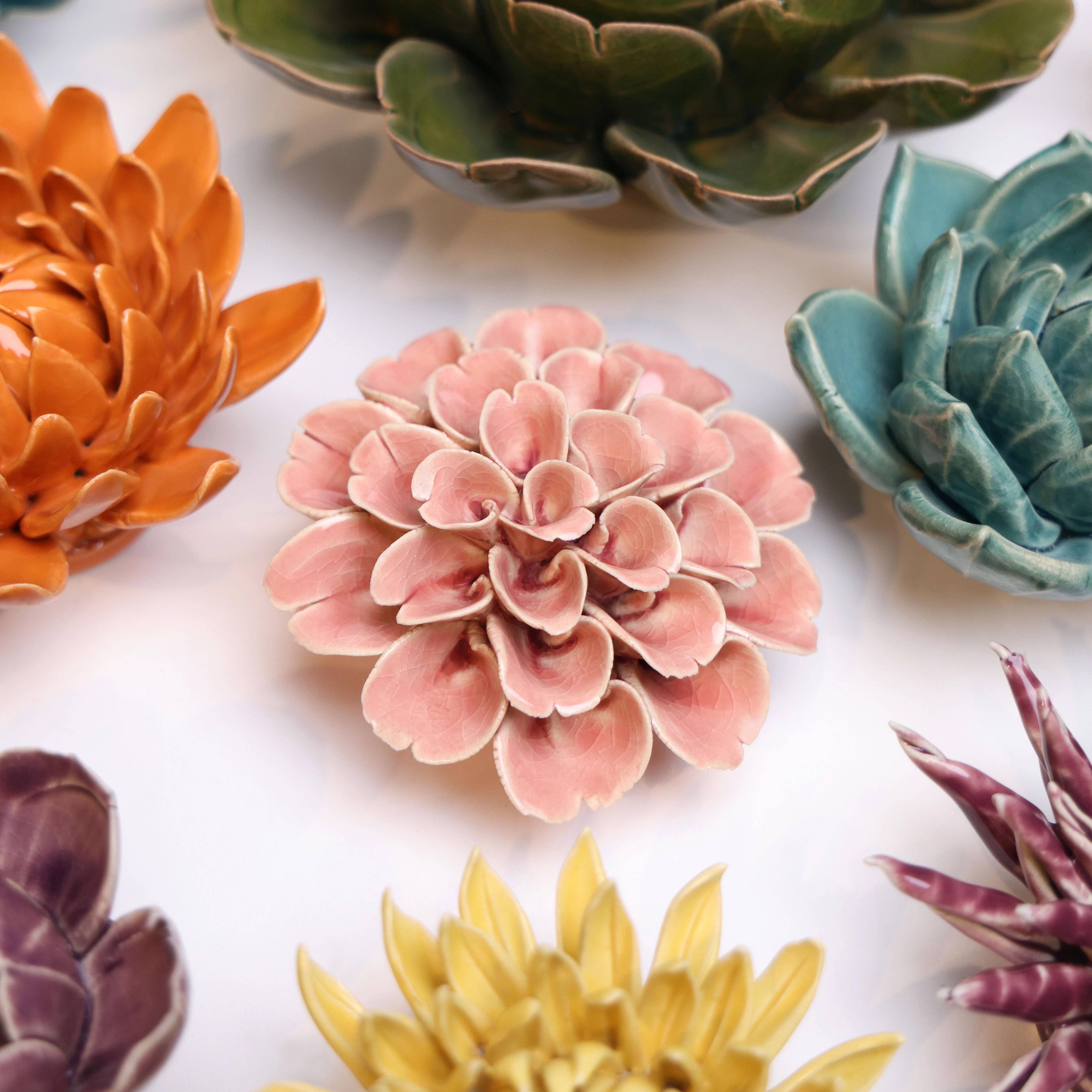Bring everlasting blooms into your space with ceramic flowers—beautiful, handmade pieces that add a touch of nature-inspired charm without the upkeep. Each flower comes packaged in a lovely gift box and features a keyhole back, so you can display it on a wall or style it on a tabletop. Perfect for creating a blooming statement that never fades.