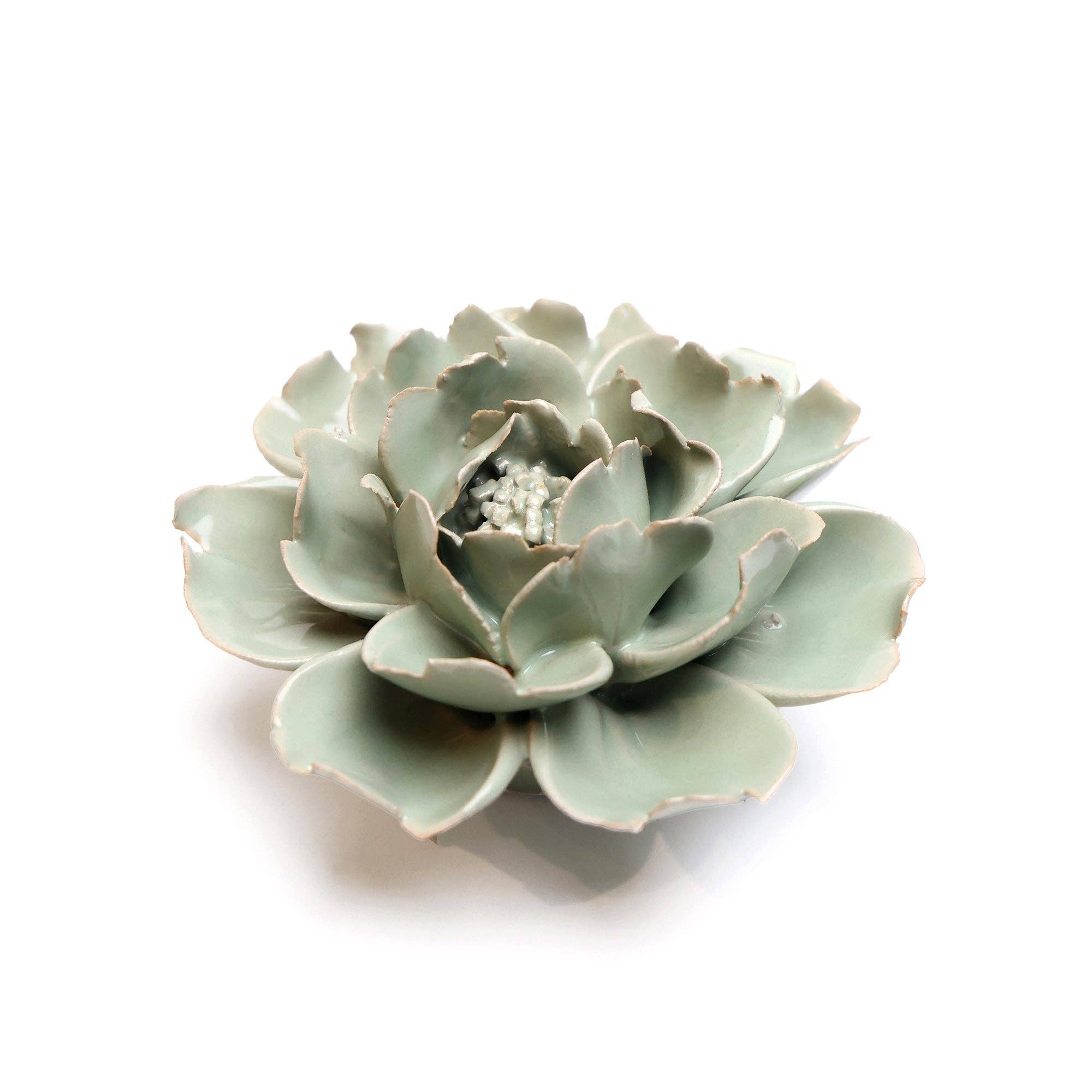 Bring everlasting blooms into your space with ceramic flowers—beautiful, handmade pieces that add a touch of nature-inspired charm without the upkeep. Each flower comes packaged in a lovely gift box and features a keyhole back, so you can display it on a wall or style it on a tabletop. Perfect for creating a blooming statement that never fades.