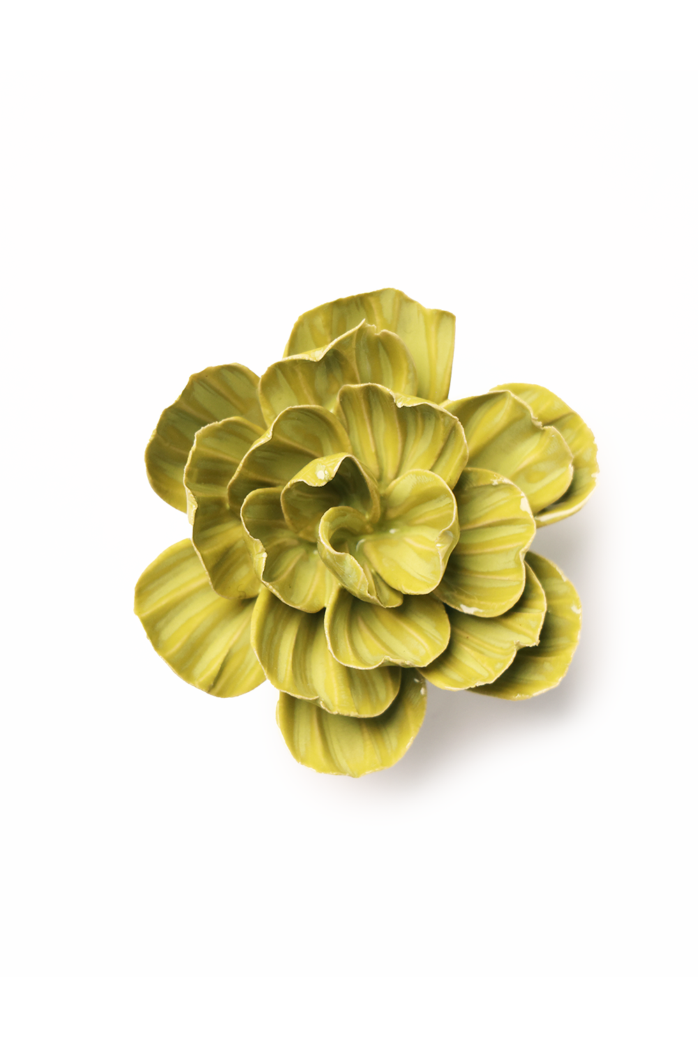 Green ceramic flower on a white background