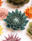 Bring everlasting blooms into your space with ceramic flowers—beautiful, handmade pieces that add a touch of nature-inspired charm without the upkeep. Each flower comes packaged in a lovely gift box and features a keyhole back, so you can display it on a wall or style it on a tabletop. Perfect for creating a blooming statement that never fades.