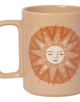 Beige mug with a sun design on a white background