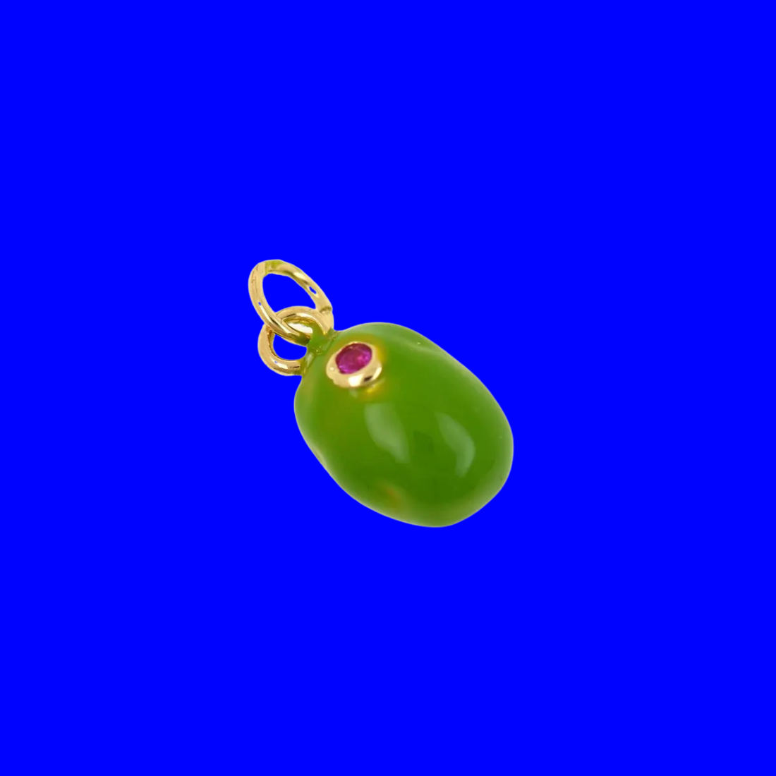 A dirty martini's best accessory, now in charm form. This enamel olive charm features a glossy green olive with a tiny pink pimento gem set right in the center — delightfully detailed and impossible not to smile at. A fun and quirky novelty charm that pairs beautifully with both premium gold-filled pieces and colorful novelty charms on any bracelet, necklace, or earring.