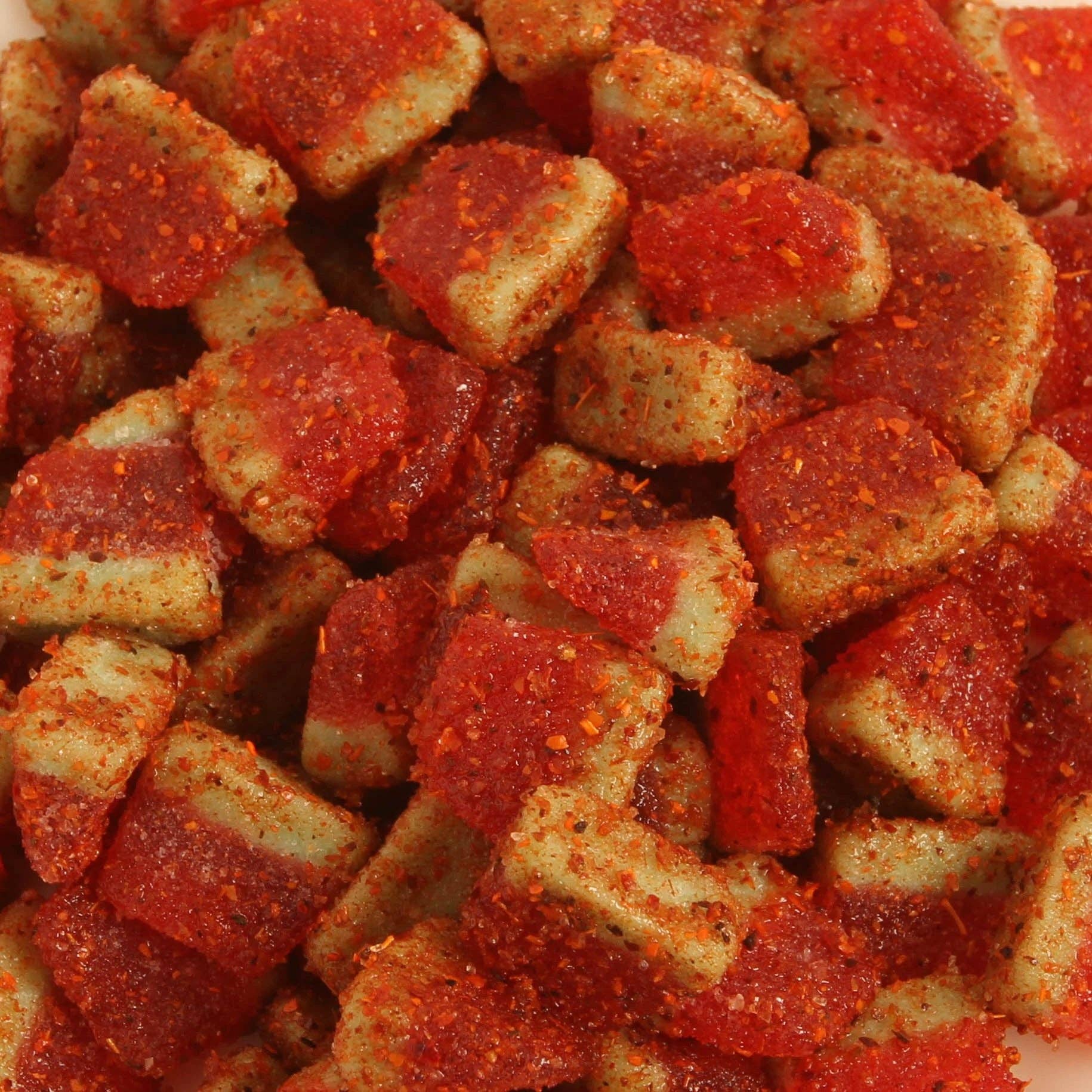 Chilli Bomba Watermelon Chamoy Candy—juicy gummies coated in tangy chamoy and chili. Sweet, sour, and spicy in every bite. Bold flavor made in the USA.
