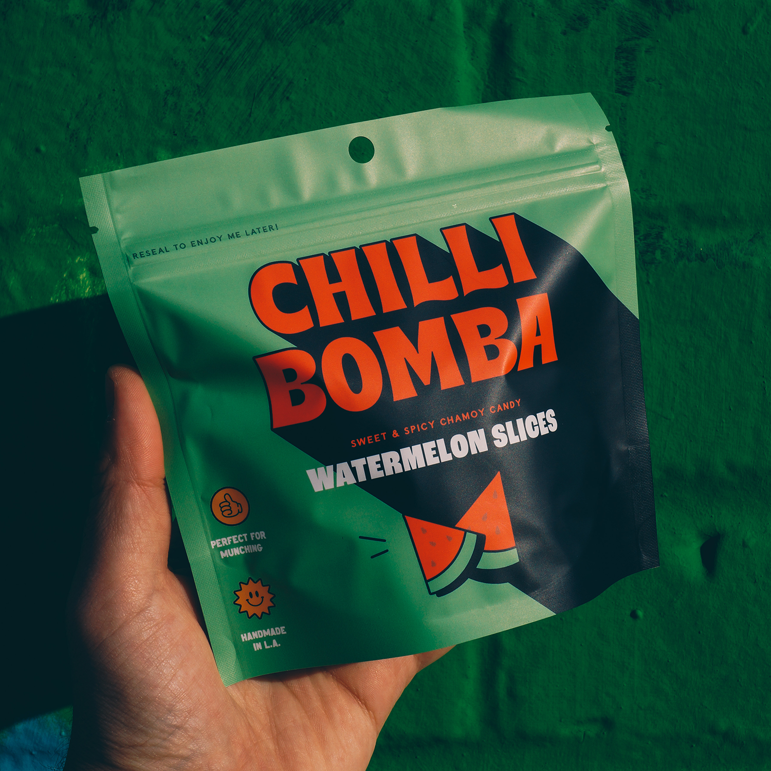 Chilli Bomba Watermelon Chamoy Candy—juicy gummies coated in tangy chamoy and chili. Sweet, sour, and spicy in every bite. Bold flavor made in the USA.