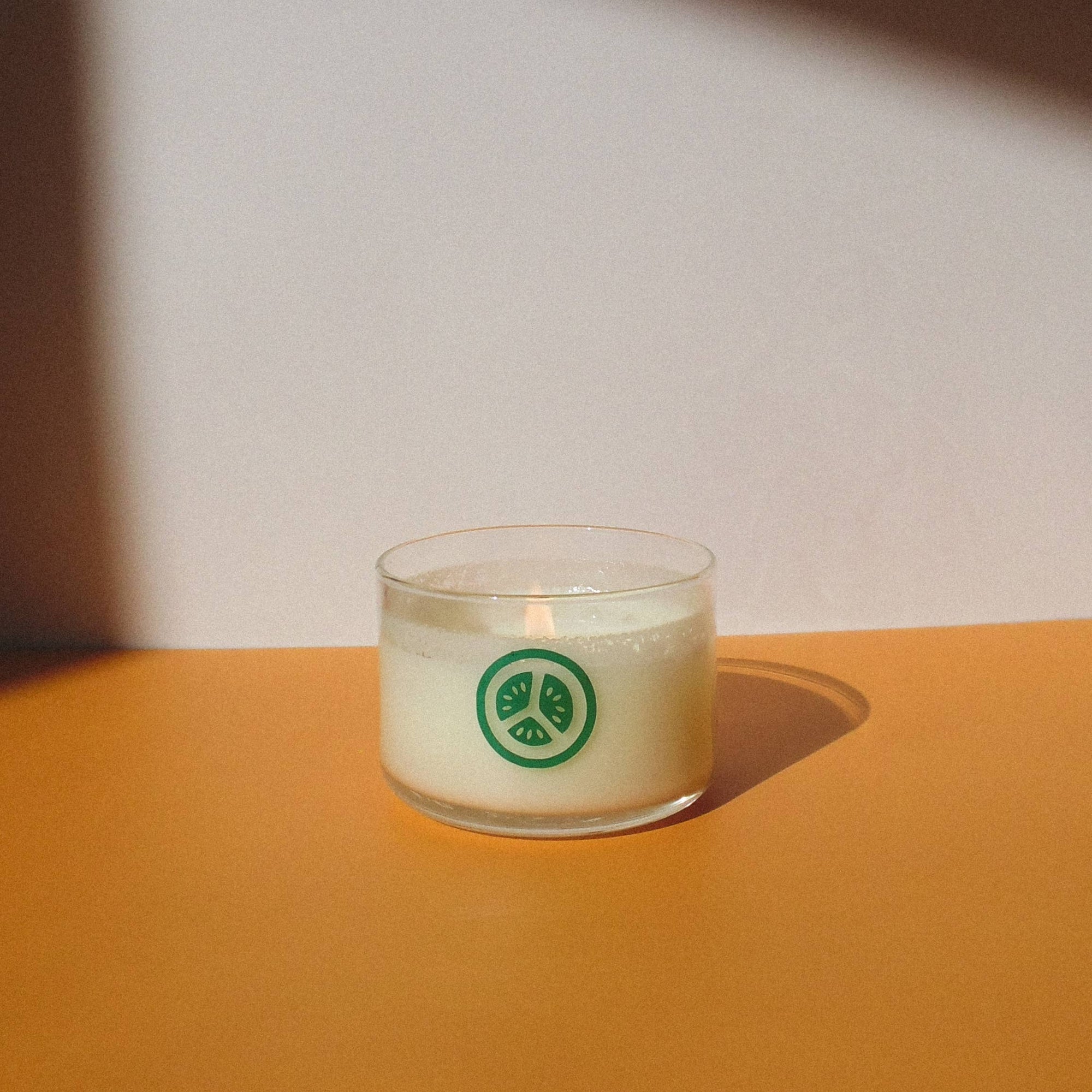 Bring summer vibes home with this Cucumber Candle—fresh, garden-picked cucumber scent with hints of dirt and vines. Made by Fresa Creative, a Latina-owned brand.