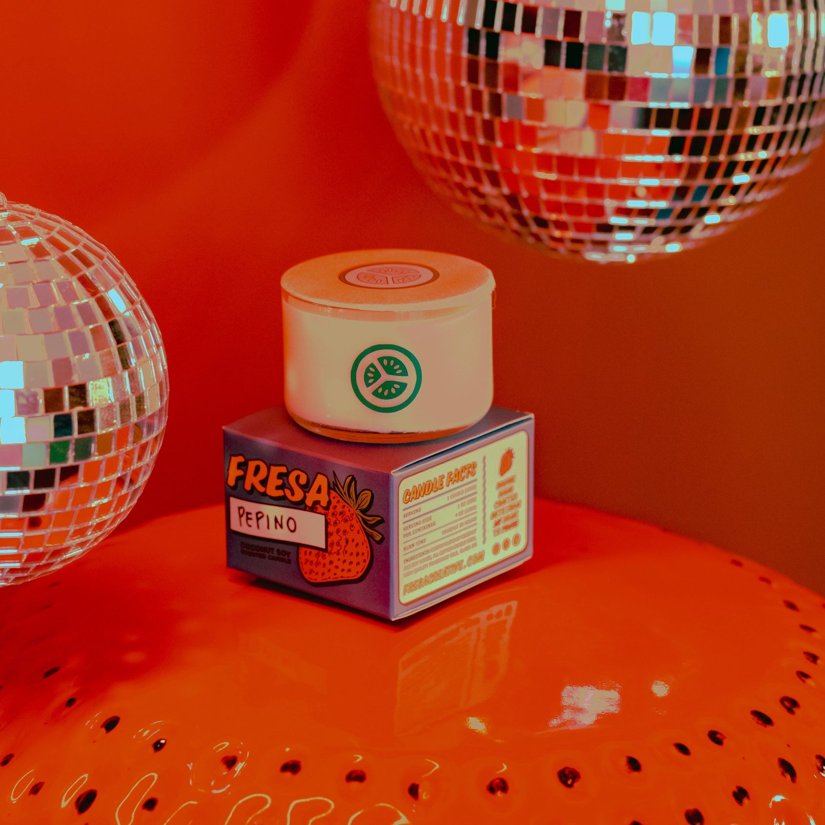 Bring summer vibes home with this Cucumber Candle—fresh, garden-picked cucumber scent with hints of dirt and vines. Made by Fresa Creative, a Latina-owned brand.