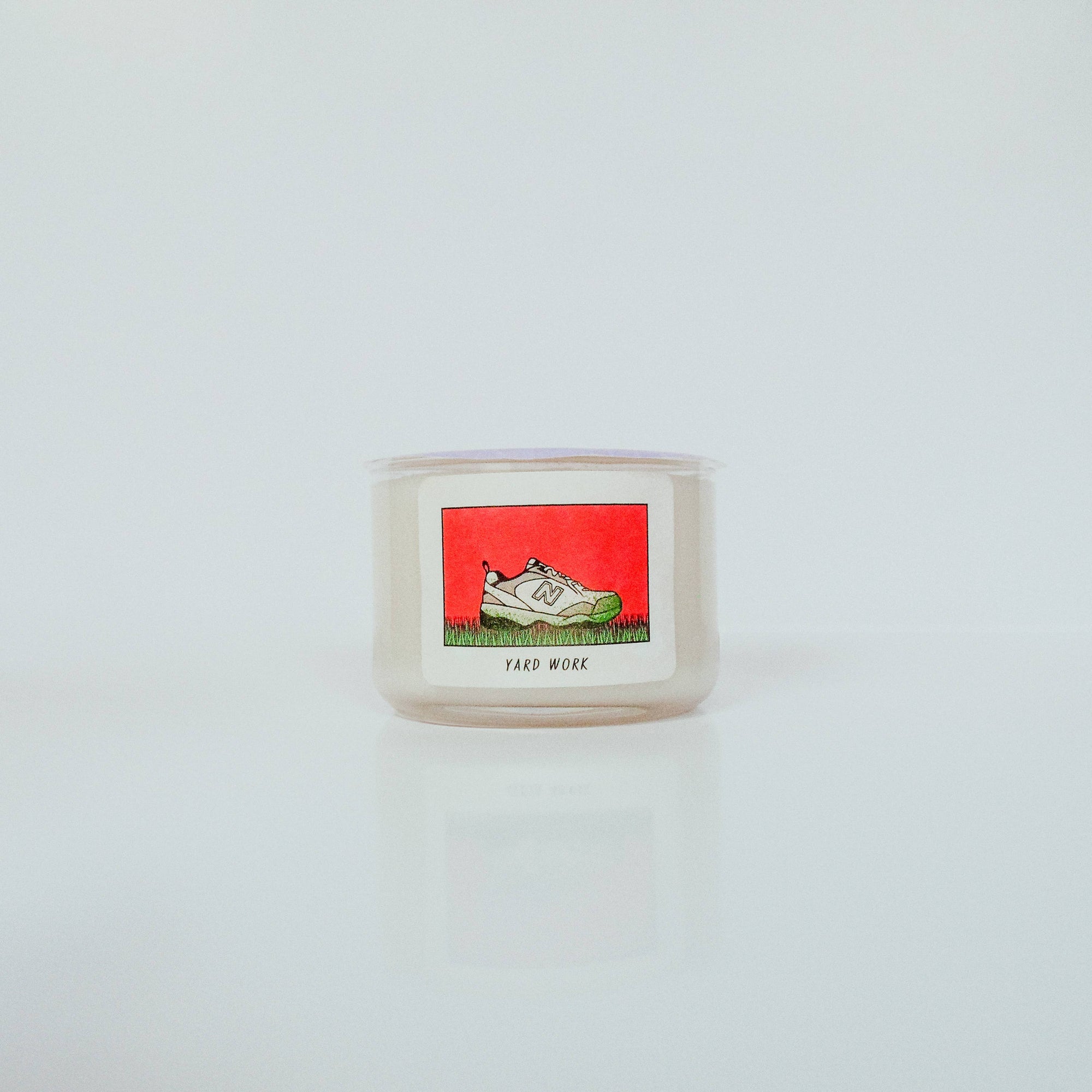 Yard Work Coconut Soy Candle captures the crisp scent of freshly cut grass—Midwest summer vibes without the allergies. Fresh, green, and true to life.